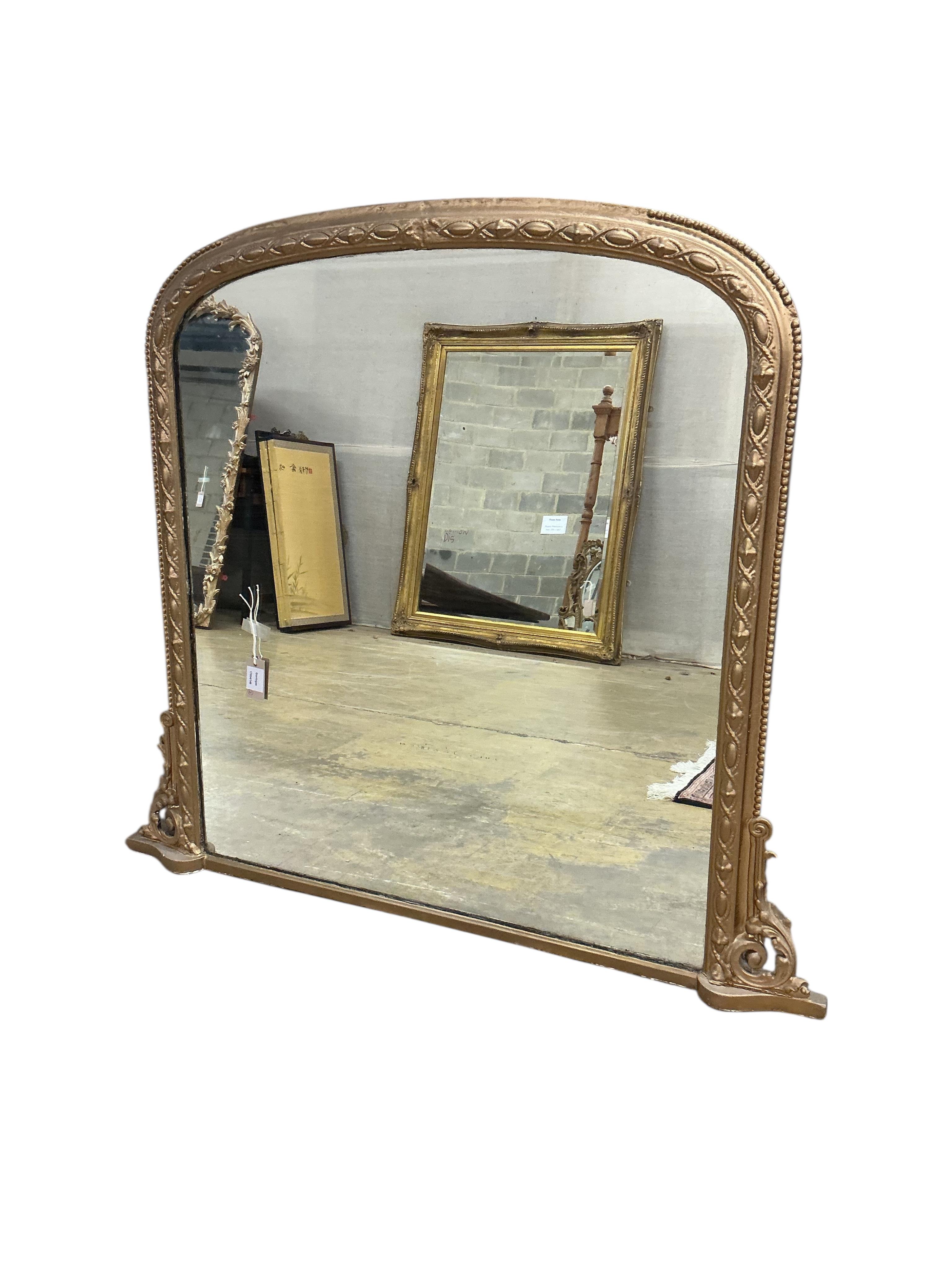A Victorian giltwood and composition overmantel mirror, later painted, width 120cm, height 107cm
